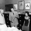 Hed: The Librarian and the General, 1955

Tokyo, Japan, Oct. 3, 1955: General Lyman Louis "L.L." Lemnitzer looks through some files in the Pacific Stars and Stripes library as librarian Toshi Tokunage looks on. Gen. Lemnitzer visited the paper's offices at Hardy Barracks on its 10th anniversary, Oct. 3, 1955. Accompanying him were Col. Karl W. Scherer, U.S. Army Forces Far East (AFFE)/Eighth Army chief of information; Lt. Col. Joe B. Goodrich, Troop Information and Education (TI&E) executive officer, and Maj. Jean W. Hollstein, one of the general’s aides.

Toshi Cooper (nee Tokunaga) was Stars and Stripes Pacific's librarian for decade, starting as the assistant librarian in 1948 but making herself quickly indispensable. 

Read an interview with Toshi on Stars and Stripes Pacific's 80 Anniversary page.
https://80.stripes.com/our-history/toshi-cooper-librarian

META TAGS: SSP 80 Anniversary; Pacific Stars and Stripes; Stars and Stripes History; Stars and Stripes personnel; newspaper history; organizational history; Toshi Cooper