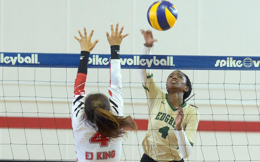 Robert D. Edgren's Elizabeth Johnson smacks a spike past E.J. King's Hanna O'Mara.