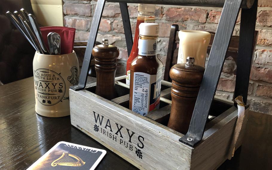 Waxy’s Irish Pub in Frankfurt, Germany, offers good pub grub, a few specialties and of course, Irish beer. The Irish Gaelic on the mug reads Drink and be happy.