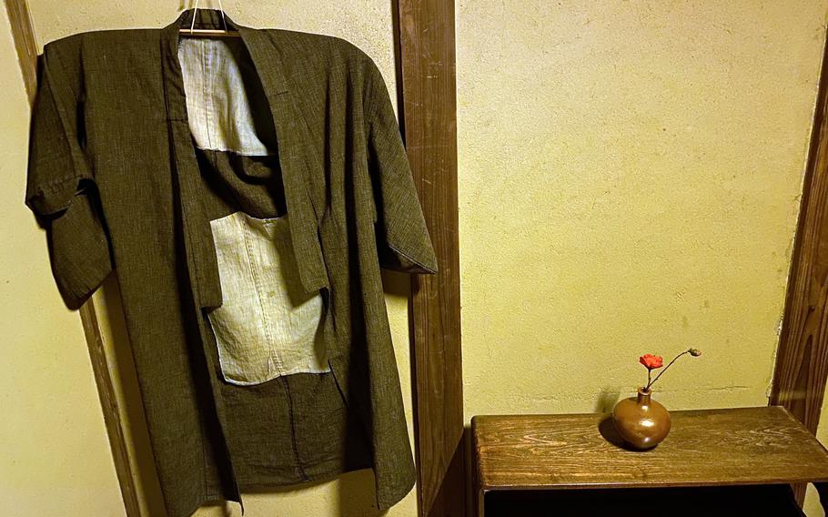 An Edo period garment hangs inside a row house at the Fukagawa Edo Museum in Tokyo. 