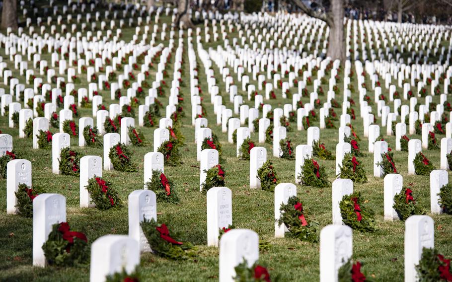 The 32nd Wreaths Across America Day in Section 33 of Arlington National Cemetery, Arlington, Va., Dec. 16, 2023. More than 30,000 volunteers placed approximately 260,000 wreaths at every gravesite and niche column at Arlington National Cemetery. 