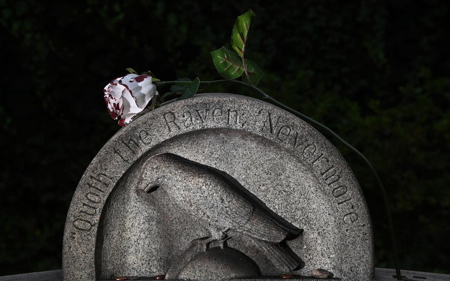 A headstone at Edgar Allan Poe’s original gravesite at Westminster Presbyterian Church and Cemetery in Baltimore, where he died in 1849. Poe’s body was moved to another site at the entrance to the cemetery. 