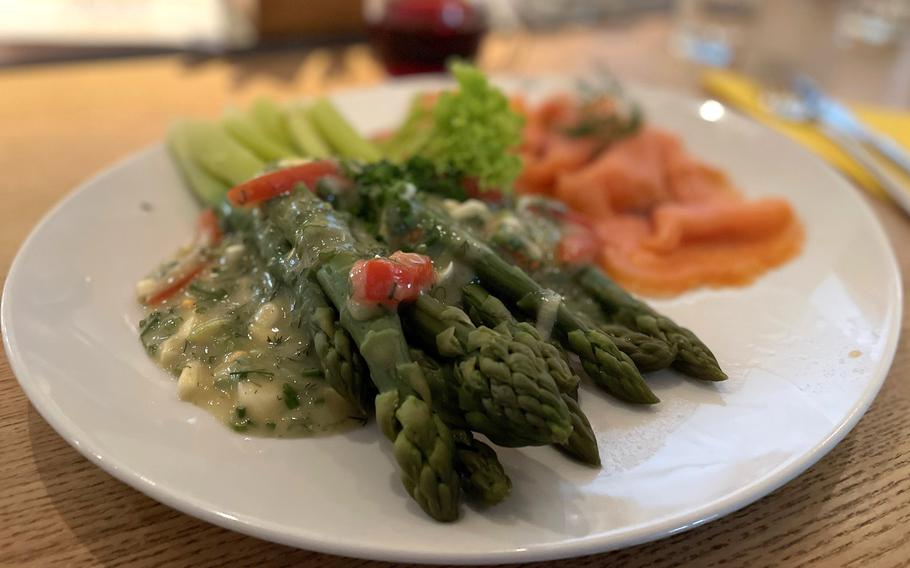 There are a variety of entrees to choose from to eat alongside the asparagus at Bauerle, a farm restaurant in Fellbach. The smoked salmon with green asparagus in a vinaigrette was especially fresh. 