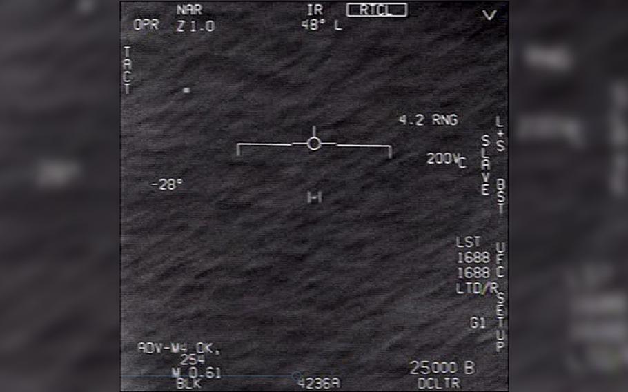 A still image from video recorded by a U.S. Navy aircraft shows a UFO over open water off the coast of Florida in 2015. The aerial phenomena observed in the video remain characterized as "unidentified," according to the Defense Department. The Pentagon is launching a new group to investigate such occurrences.
