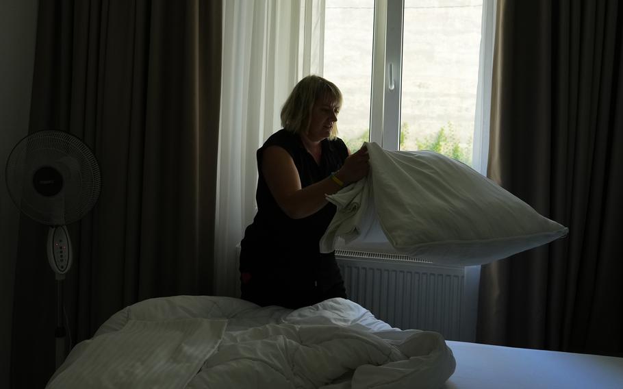 Ukrainian refugee Liudmyla Chudyjovych makes up a room in a hotel where she works, Wednesday, Aug. 3, 2022, in Prague, Czech Republic. Nearly six months after the Russian invasion of Ukraine, many refugees are still struggling to find jobs in their European Union host countries, despite the EU's streamlined process for Ukrainians to live and work in any of its 27 member nations.