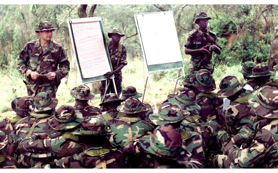 U.S. Special Forces soldiers instruct Ugandan soldiers in peacekeeping tactics at the training camp in Kabamba, Uganda.