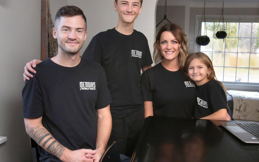 Josh, Logan, Heather and Charli Scott are shown in their home in North Canton on Nov. 22. The family has traveled the country filming World War II veterans and shares the stories on a YouTube channel that has more than 300,000 subscribers.