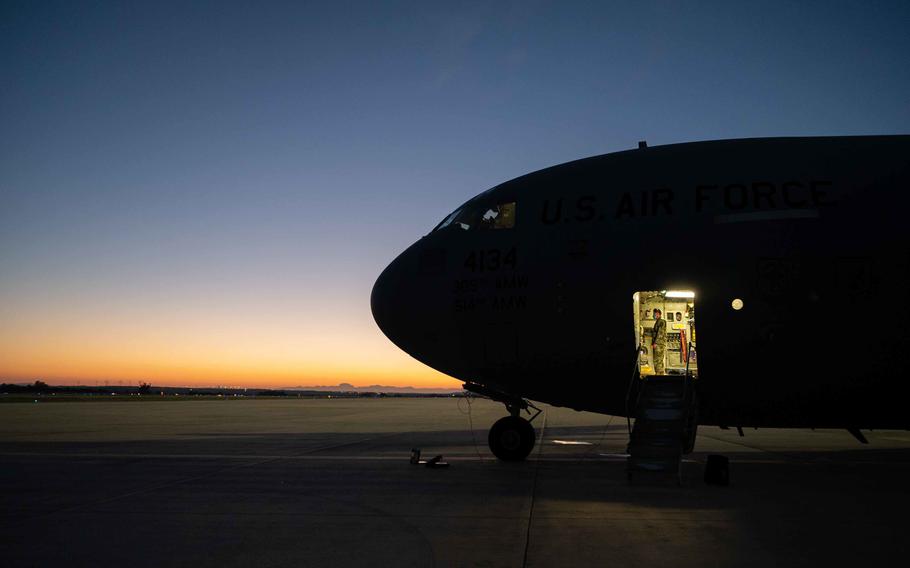 A crew member works on a C-17 Globemaster III, April 4, 2022, at Naval Station Rota, Spain. Unexpectedly high winds affected Air Mobility Command aircraft on the Rota flight line early Wednesday, Dec. 14.