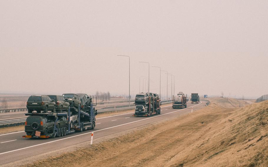 A convoy with military supplies moves on a Poland highway toward the border with Ukraine on March 16. 