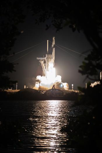 A SpaceX Falcon 9 rocket carrying a Navy experiment on a resupply mission to the International Space Station lifts off Tuesday, March 14, 2023, from NASA’s Kennedy Space Center in Florida. The Navy’s experimental project, known as SWELL, will spend a year in orbit to learn how laser-based power beaming technology works in space. 