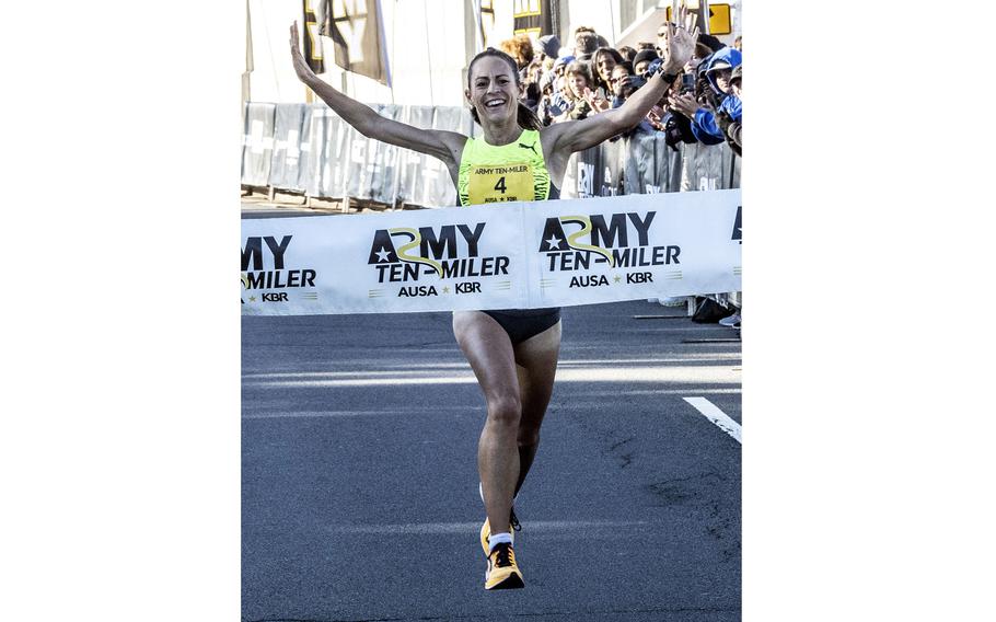 Jenny Simpson of Boulder, Colo., stepping up in distance and recovering from injuries that have sidelined her for a year, was the winner of the women’s race in a time of 54:15.43.