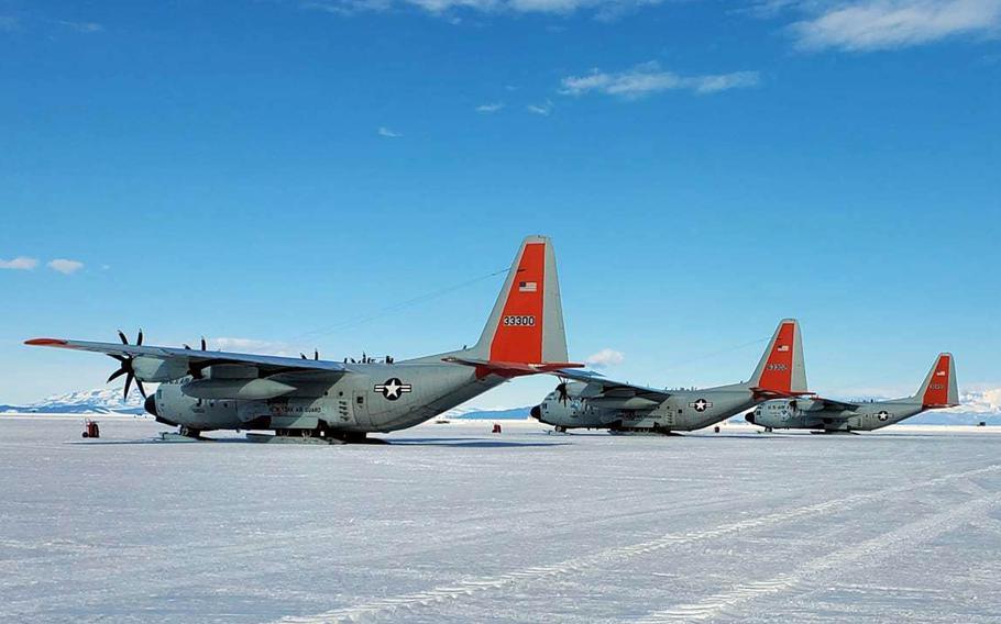 LC-130s sit on the flight line at McMurdo Station, Antarctica, in 2021. The aircraft is equipped with retractable skis that allow it to take off and land on snow and ice as well as on conventional runways.