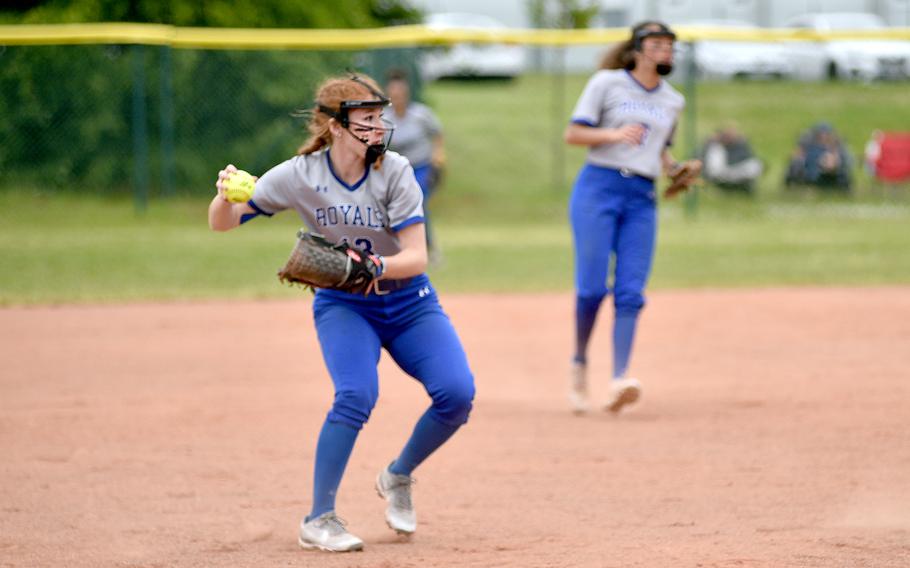 Ramstein third baseman Lily Rethage throws to first base during a Division I DODEA European softball semifinal against Vilseck on May 19, 2023, on Ramstein Air Base, Germany. The Royals won, 9-0.