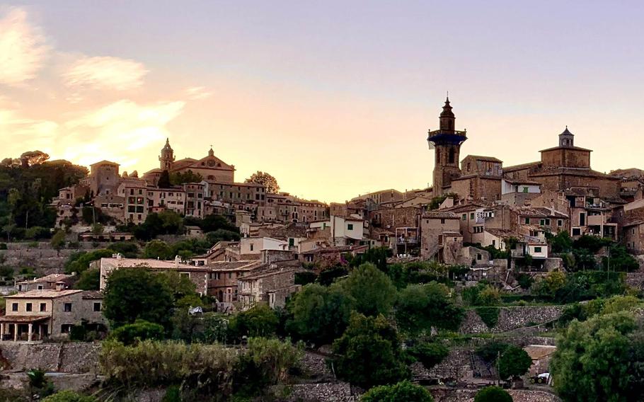 The medieval village of Valldemossa hugs a hillside in the Serra de Tramuntana. UNESCO has listed the mountains as a World Heritage site. t