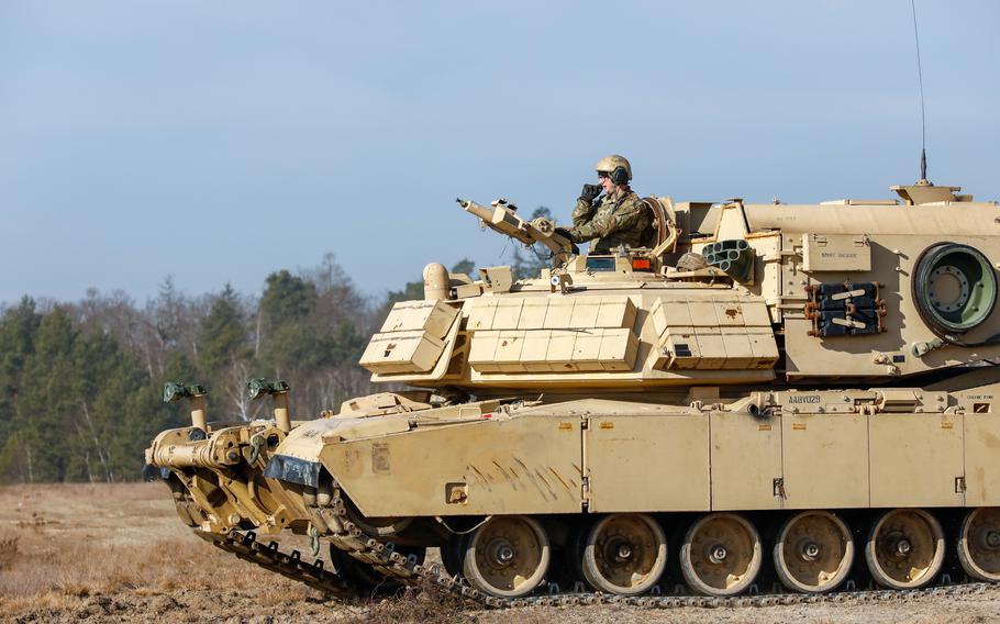 Spc. Bradley Williams, a combat engineer assigned to Bravo Company, 1st Brigade Engineer Battalion, 1st Armored Brigade Combat Team, 1st Infantry Division, commands an M1150 Assault Breacher Vehicle at Karliki, Poland, March 2, 2022. The 1st ABCT's tour extension means the Army will have three armored brigades operating in Europe simultaneously.