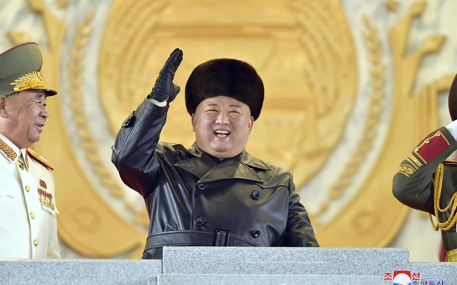  In this photo provided by the North Korean government, North Korean leader Kim Jong Un waves as he attended a military parade, marking the ruling party congress, at Kim Il Sung Square in Pyongyang, North Korea, Jan. 14, 2021. North Korea on Thursday, Dec. 30, 2021, urged its 1.2 million troops to unite behind leader Kim Jong Un and defend him with their lives, as the country celebrated the 10th anniversary of his ascension to supreme commander of the military. The content of this image is as provided and cannot be independently verified. Korean language watermark on image as provided by source reads: "KCNA" which is the abbreviation for Korean Central News Agency.