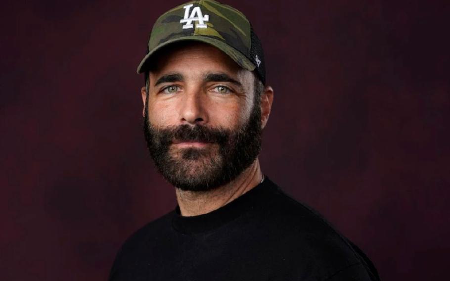 A headshot of Brian Bloom.