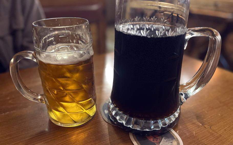 A 2-liter cola sits next to a 1-liter drink at XXL Restaurant Waldgeist Hofheim, Germany, on March 18, 2024. 