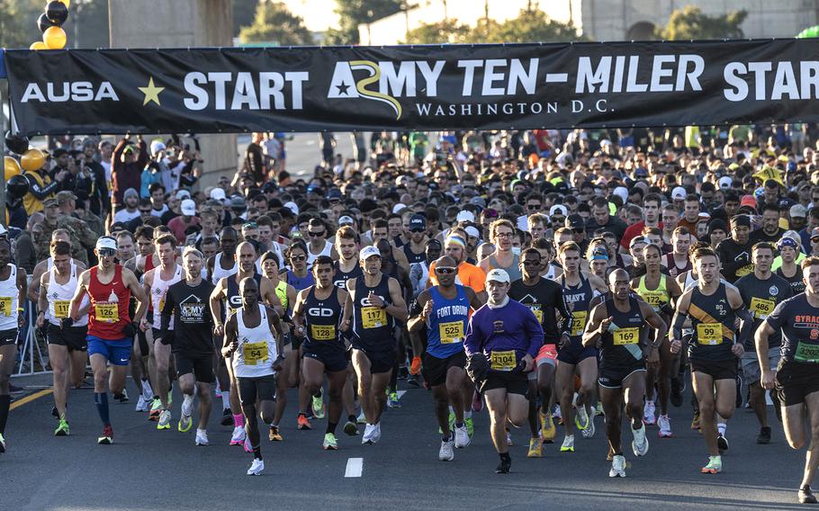 Runners in the Army 10-Miler break from the starting line Sunday, Oct. 9, 2022, at the Pentagon.