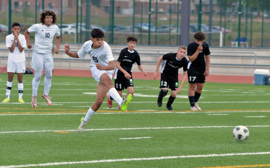 Ansbach’s Chris Roman converts a penalty to give the Cougars a 1-0 win over Alconbury in the boys Division III final at the DODEA-Europe soccer championships in Ramstein, Germany, May 22, 2025.