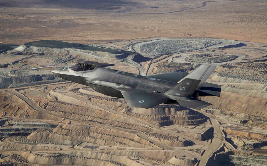 An F-35A, in flight above the Mojave Desert in Calif., Jan. 6, 2023. The U.S. announced the first semiconductor grant under the 2022 Chips Act, awarding $35 million to the U.S. subsidiary of British aerospace firm BAE Systems Plc to ramp up manufacturing of military chips. The money will help a BAE facility in Nashua, N.H., quadruple production of chips that are used in F-15 and F-35 fighter jets, the Commerce Department said.