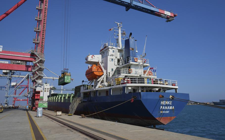 Containers are loaded onto a Panamanian-flagged ship.