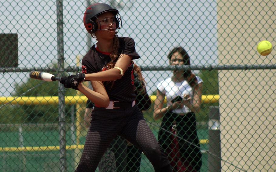 King's Mila Nishimura-Reed makes contact.