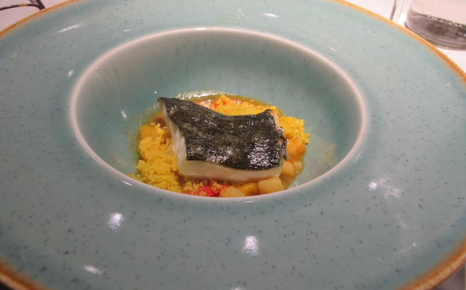 A second course at dinner in the restaurant of Hotel Mioni Pezzato in Abano Terme, Italy, fish on a bed of couscous, was recommended by my server and was utterly delicious. 