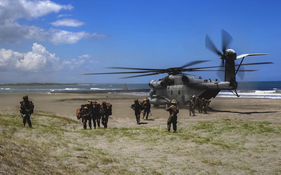 U.S. Marines with 1st Battalion, 3d Marines, 3d Marine Division, arrive via a CH-53E Super Stallion during Balikatan 22 at Appari, Philippines, on March 28, 2022. 