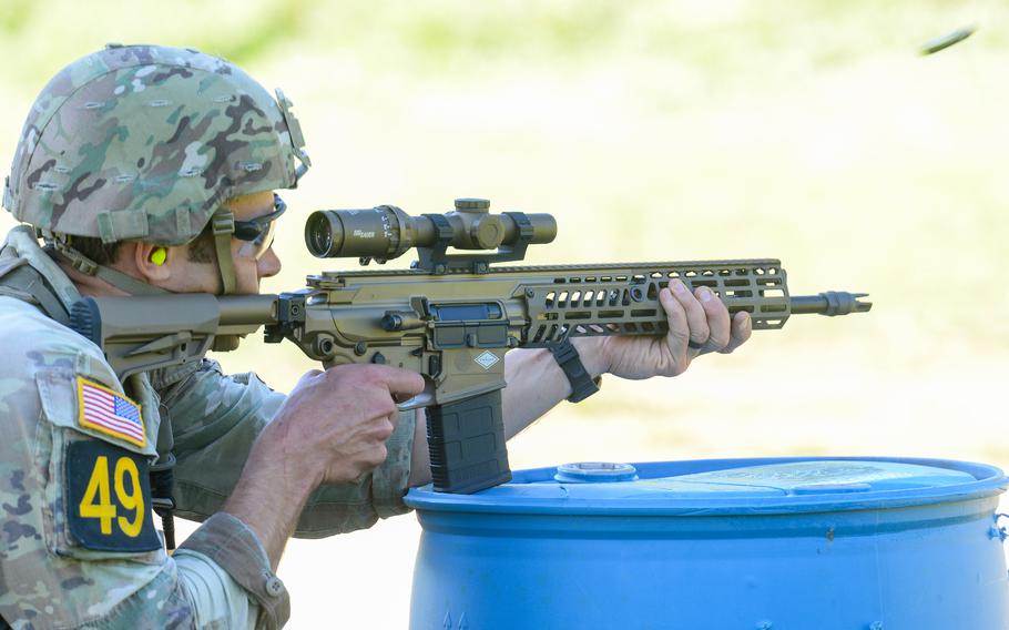 Sgt. 1st Class Michael Brown shoots a target during the final day of the Army’s annual Best Ranger Competition on Sunday, April 14, 2024, on Fort Moore, Ga. 