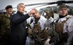 NATO Secretary-General Jens Stoltenberg talks to troops in Bardufoss, Norway, on March 25, 2022, at the biennial Cold Response exercise. Service members from 27 NATO allies and partner countries are participating in this year's exercise.