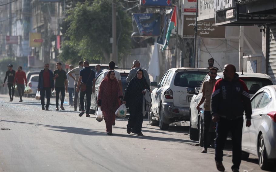 A number of Palestinian families evacuate their homes Friday. 