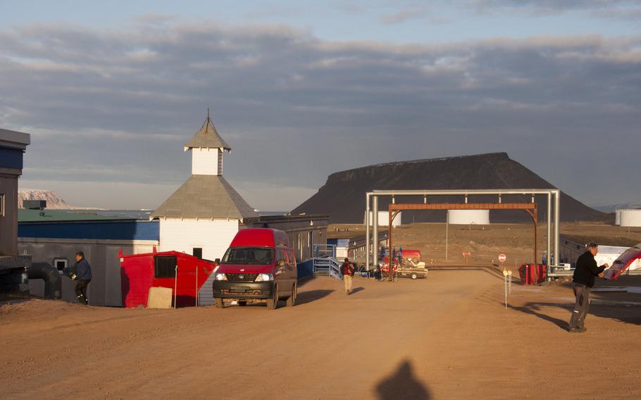 The chapel at Thule Air Base, called “the First Church of Thule,” at left. In the distance at left is Saunders Island, and past the piping that carries all the plumbing and electrical for the base, Mount Dundas.