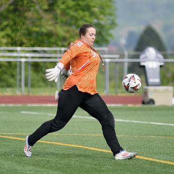 Meghan McConville punts the ball.
