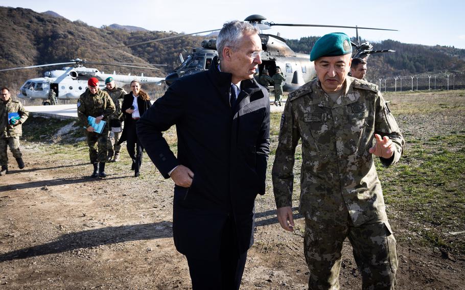 NATO Secretary-General Jens Stoltenberg talks with Kosovo Force commander, Turkish Maj. Gen. Özkan Ulutas, during a visit to KFOR's Camp Nothing Hill in Kosovo, Nov. 20, 2023.