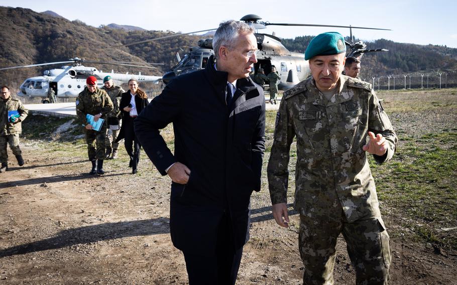 NATO Secretary-General Jens Stoltenberg talks with Kosovo Force commander, Turkish Maj. Gen. Özkan Ulutas, during a visit to KFOR's Camp Nothing Hill in Kosovo, Nov. 20, 2023.