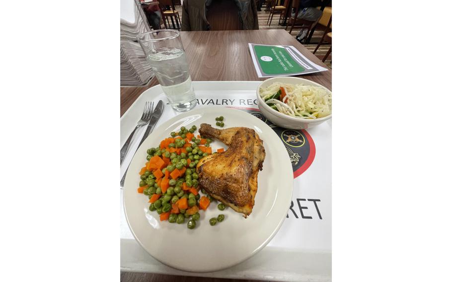 Dinner at the Vilseck dining facility featuring chicken, vegetables and salad on Feb. 6, 2022 at Vilseck, Germany. The facility received an "F" grade from health inspectors on Feb. 3. Army officials said they are addressing the deficiencies.