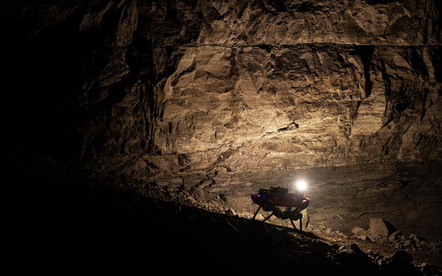 A CERBERUS robot navigates the cavern during the DARPA Subterranean Challenge.
