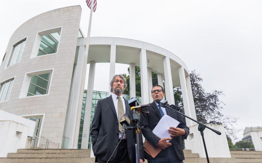 Attorneys Thomas Lesser, left, and Michael Aleo announce the filing of a class action lawsuit in U.S. District Court over deaths tied to a COVID-19 outbreak at the Holyoke Soldiers’ Home, July 17, 2020.