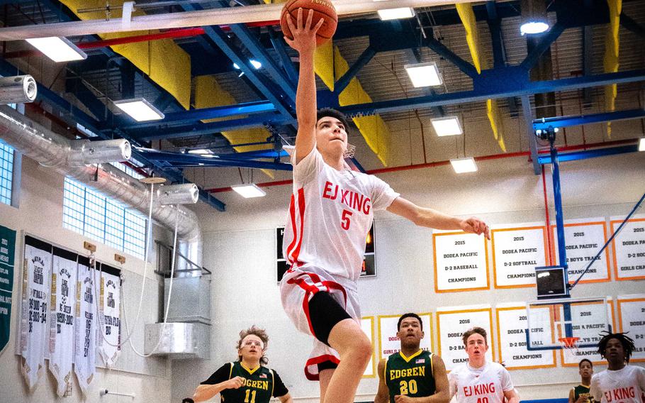 E.J. King junior Cameron Reinhart scored a combined 92 points, with 21 three-point goals, during Friday's games played by the Cobras, all victories, in the DODEA-Japan boys basketball tournament.