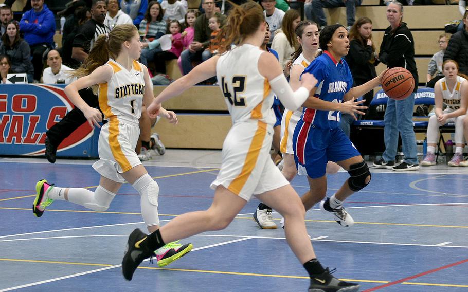 Ramstein's Aliyah Jones drives to the bucket on a fas break during the Royals' 47-35 win over Stuttgart on Saturday at Ramstein High School. Defending are Panthers, from left, Haley Wells, Anna Thompson and Bella Henderson.