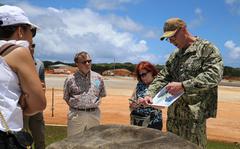 Navy Capt. Steven Stasick, of Marine Corps Marianas, discusses various building projects with members of the Guam Chamber of Commerce at Camp Blaz, April 20, 2022.
