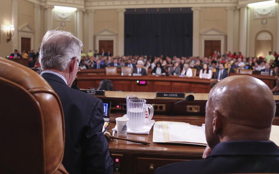 House Ways and Means Committee Chairman Richard Neal, left, presides over a hearing.