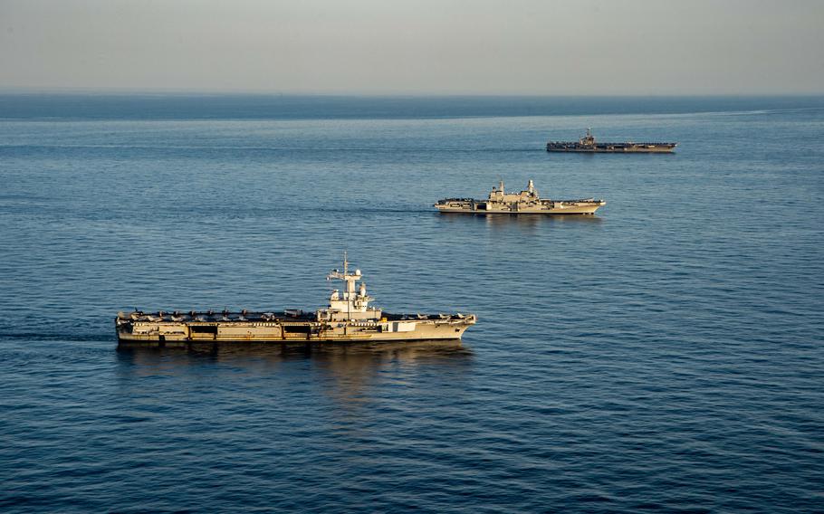 From right to left, Nimitz-class aircraft carrier USS Harry S. Truman, the Italian aircraft carrier ITS Cavour and the French aircraft carrier Charles de Gaulle transit the Mediterranean Sea in formation, Feb. 6, 2022. Allied ships were shadowed by their Russian counterparts, NATO officials said. Six Russian amphibious ships are now entering the Black Sea for a naval exercise, according to Russian reports.