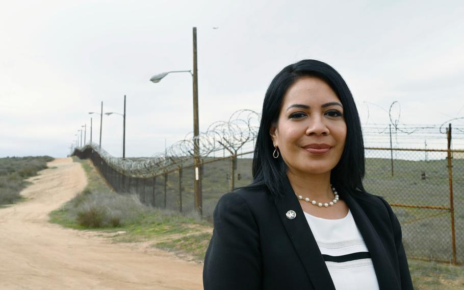 Grace Martin, executive director of the March Joint Powers Authority, stands by former March Air Force Base property ticketed for future development. After almost 30 years, the authority, which helped transform military surplus land around what is now March Air Reserve Base into a bustling hive of businesses, is winding down.