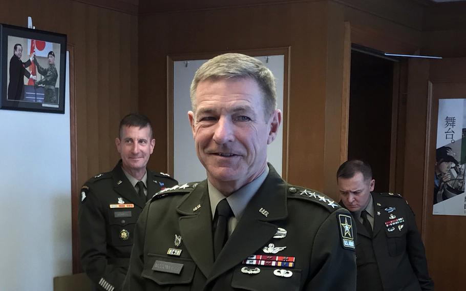 U.S. Army Chief of Staff Gen. James McConville receives an award for service to Japan, the Grand Cordon of the Order of the Rising Sun, at Camp Ichigaya in Tokyo, Monday, May 8, 2023.