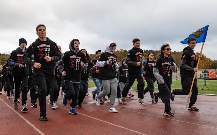 Air Force JROTC cadets from Kaiserslautern and Ramstein High School make their way around the track at Kaiserslautern High School 22 times, as part of a Veterans Day march on Friday, Nov. 10, 2023.