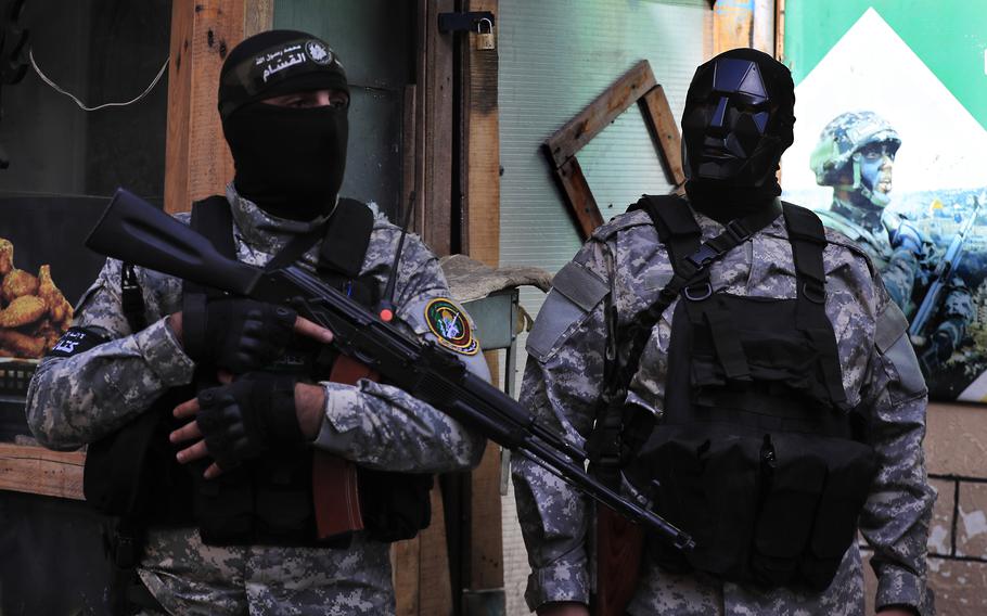 Hamas fighters dressed in uuniform.