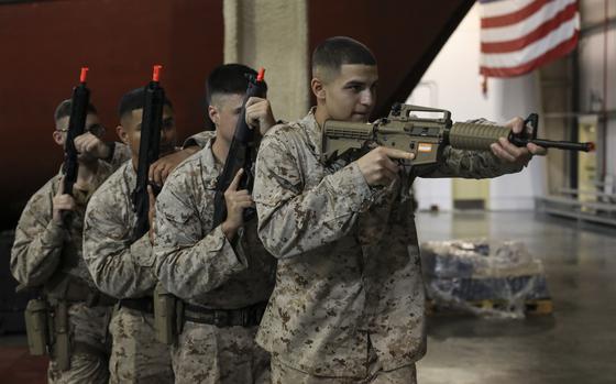 U.S. Marines assigned to Fleet Anti-terrorism Security Team Company Central stack up during close-quarters training in Bahrain, July 03, 2023. Marines in Bahrain also are training for potential shipboard roles protecting oil tankers and other commercial ships from Iranian aggression, a U.S. official said.