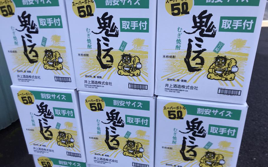 Boxes of shochu are stacked at the Inoue Shuzo Co. distillery in Nichinan City, Japan.